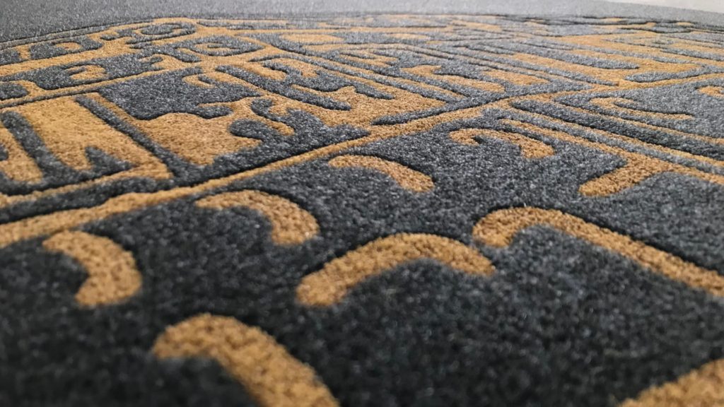 Dettaglio intarsio tappeti personalizzati MADO Group - Tappeti personalizzati con effetto rilievo